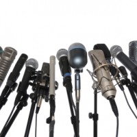 Microphones Over White Background